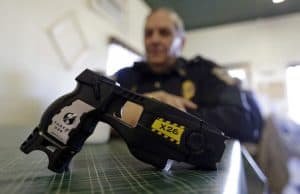 how many volts are in a police grade taser